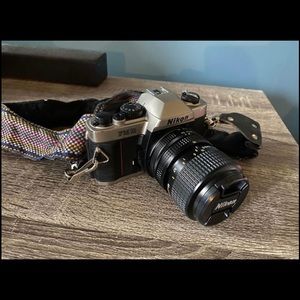 Nikon FM10 35 mm camera and bag, vintage